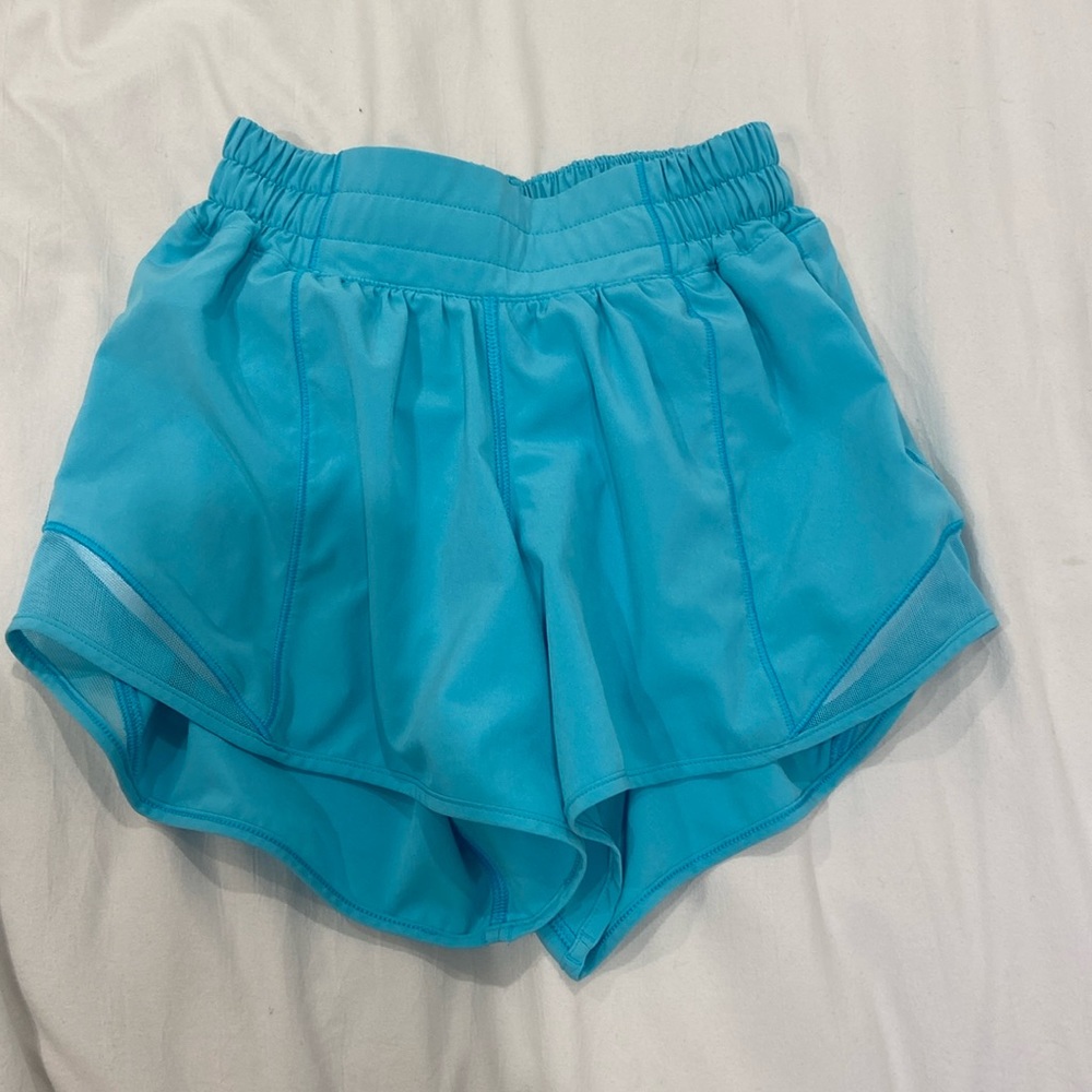 Lululemon size 0, 4” inseam shorts. Electric teal. Worn twice.